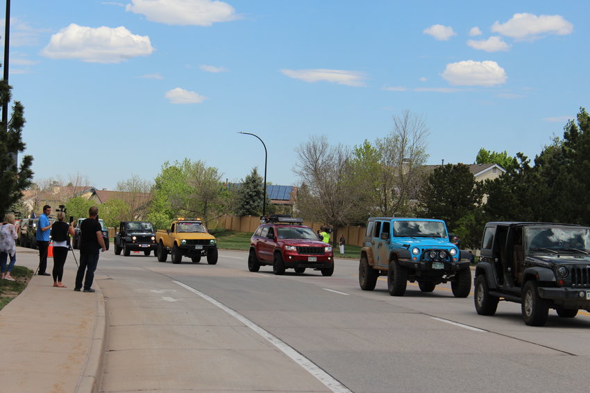 A processional of Jeeps rides through Highlands Ranch May 15 in commemoration of Kendrick Castillo, who had an affinity for cars, specifically his green Jeep Cherokee.